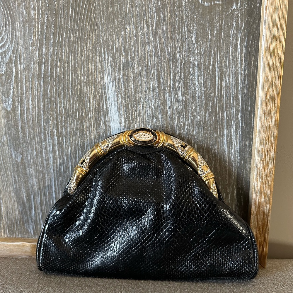Elegant Black Clutch with Gold Accents